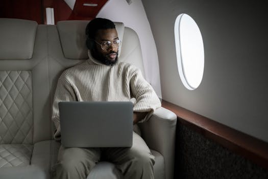 Traveler checking flight prices on a laptop